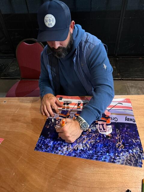 Cal Clutterbuck, Matt Martin & Casey Cizikas TRIPLE Autographed 16x20 Photo (JSA)