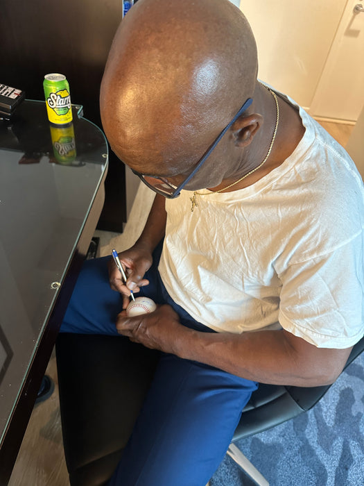 Mookie Wilson Autographed OML Baseball w/ It Gets through Buckner (JSA)