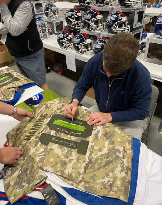 Eli Manning Autographed Nike Salute to Service Jersey with Multi Inscription (Fanatics)