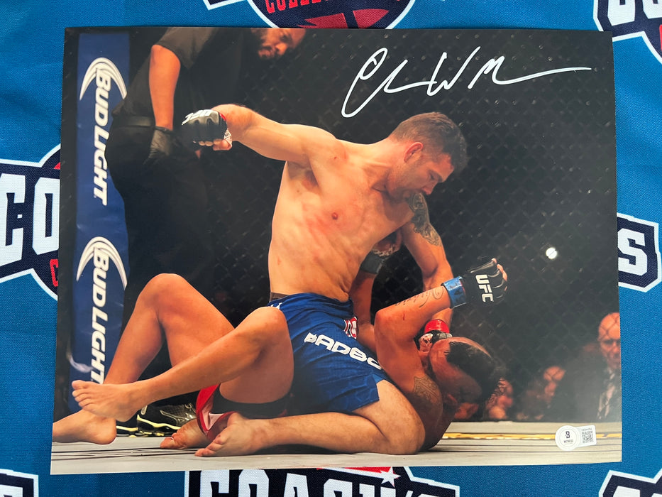 Chris Weidman Autographed UFC 187 Knockout 11x14 Photo (Beckett)