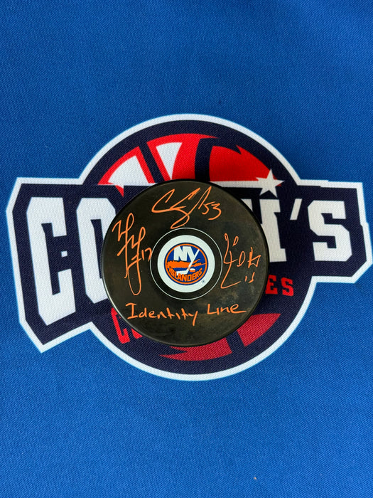 Cal Clutterbuck, Casey Cizikas & Matt Martin TRIPLE Autographed NY Islanders Logo Puck w/ Inscr (JSA)