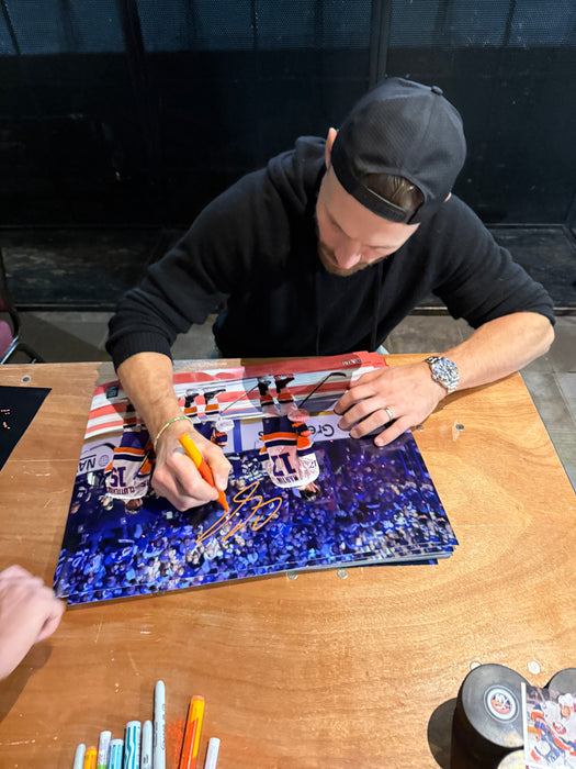 Cal Clutterbuck, Matt Martin & Casey Cizikas TRIPLE Autographed 16x20 Photo (JSA)