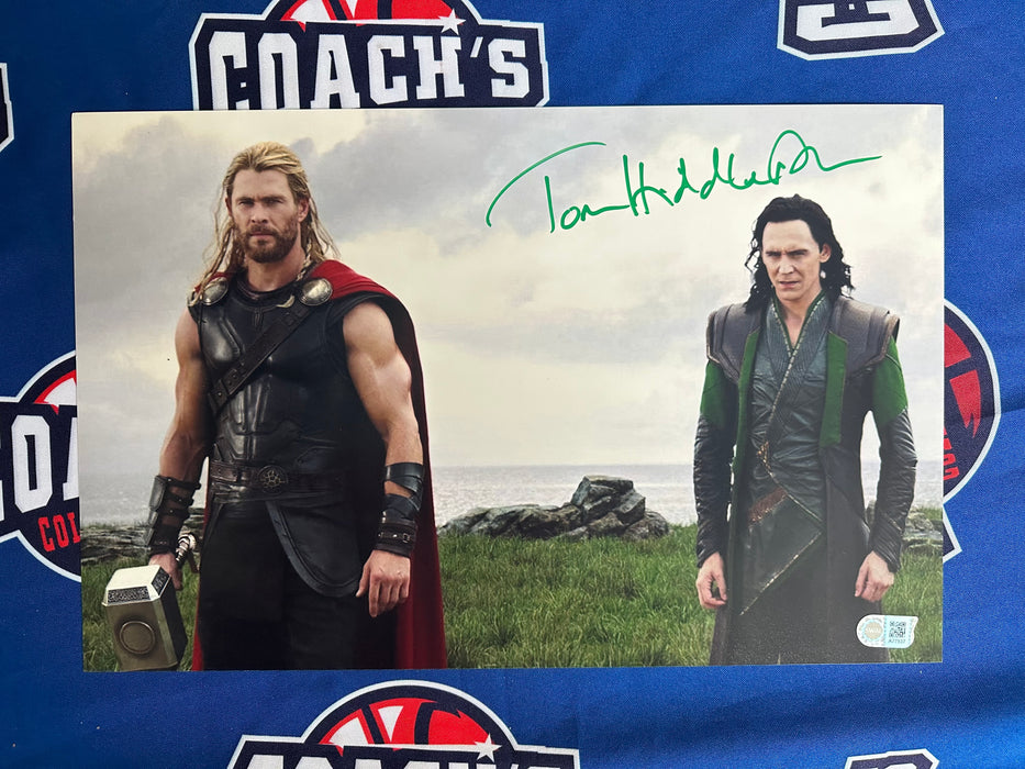 Tom Hiddleston Autographed 11x17 Loki with Thor Photo (SWAU)