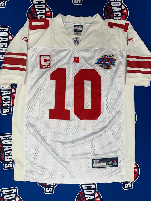 Eli Manning Autographed NY Giants Reebok White Road Jersey with Multi Inscription (Fanatics)