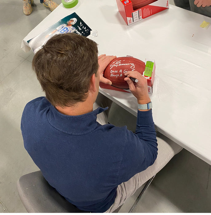 Eli Manning Autographed NFL Official "The Duke" Football with Once a Giant, Always a Giant Inscription (Fanatics)