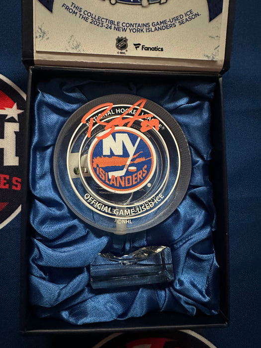 Brock Nelson Autographed NY Islander Crystal Puck-Filled with UBS Ice from 2023-2024 Season (Fanatics)