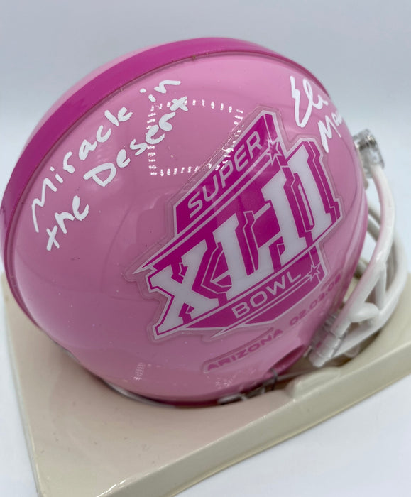 Eli Manning Autographed SB XLII PINK Breast Cancer Awareness Mini Helmet with Miracle In the Desert Inscription (Fanatics)